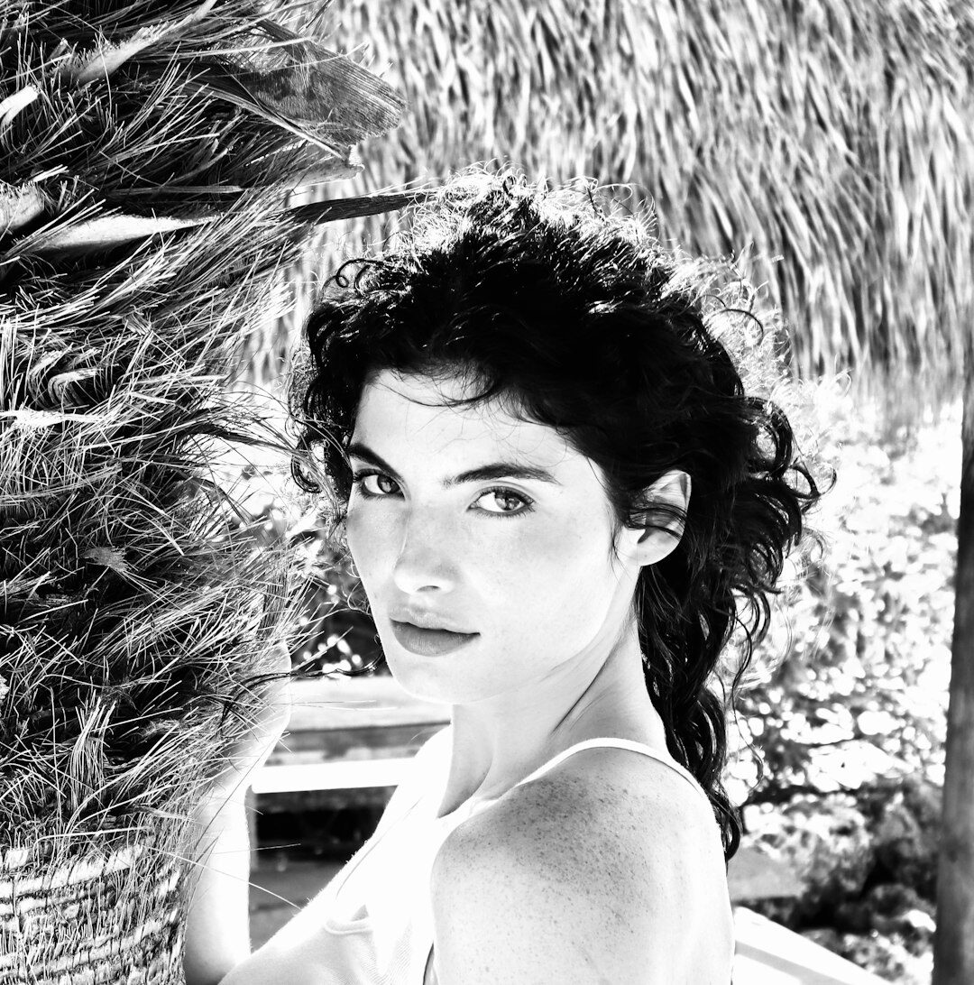 Portrait of a brazilian woman with curly hair smiling