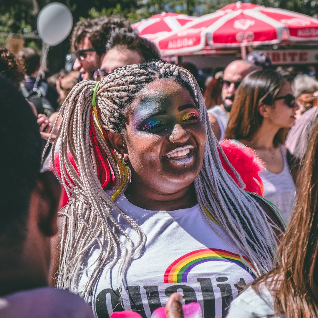 Portrait of a young brazilian woman with braids smiling
