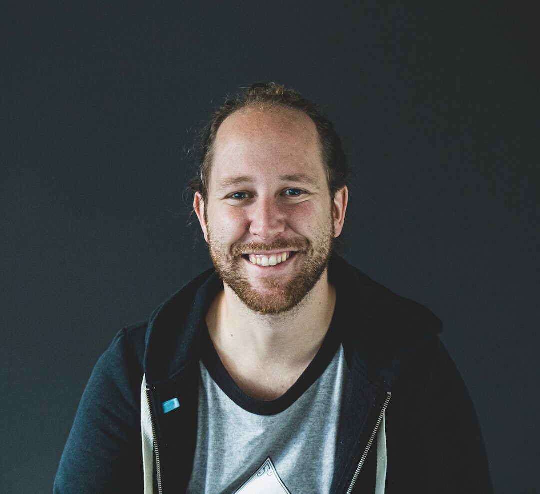 Portrait of a brazilian man with short beard smiling