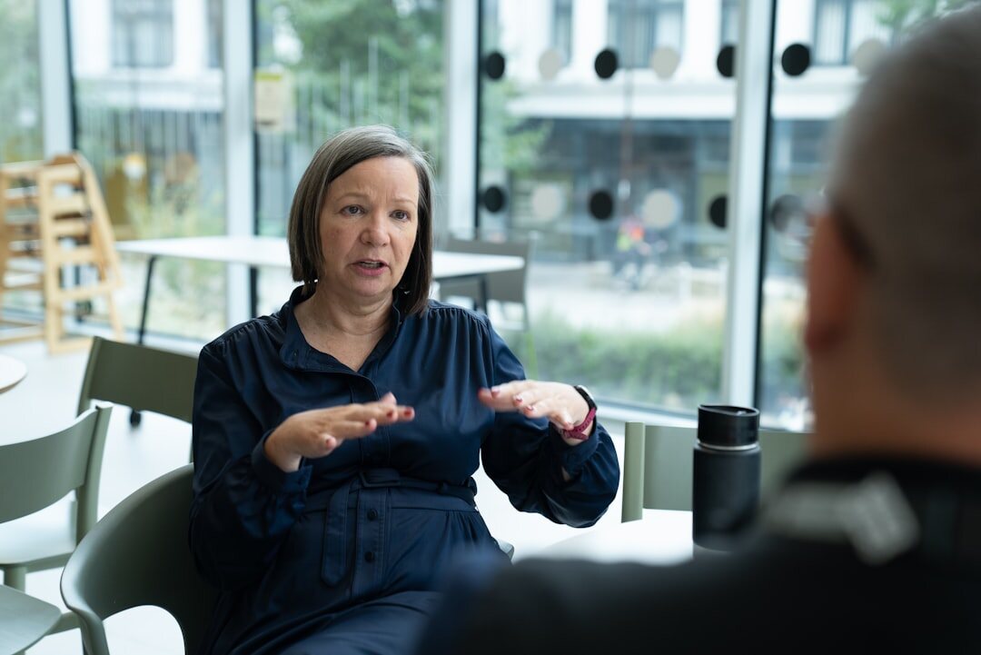 professional woman speaking in meeting