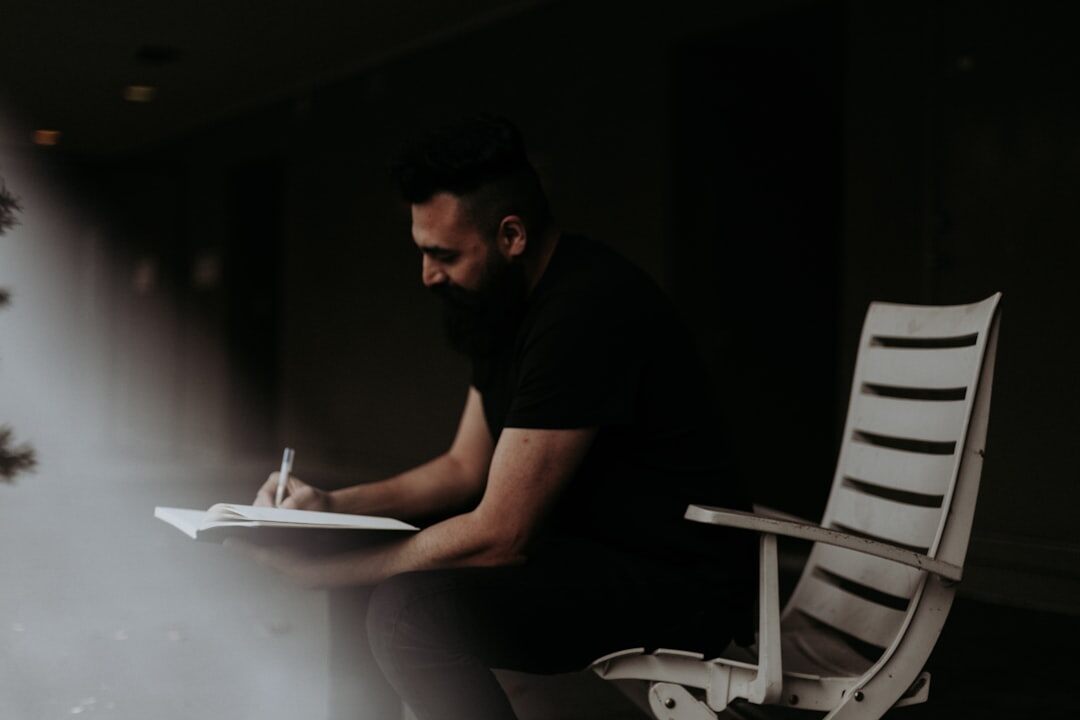 person journaling reflection